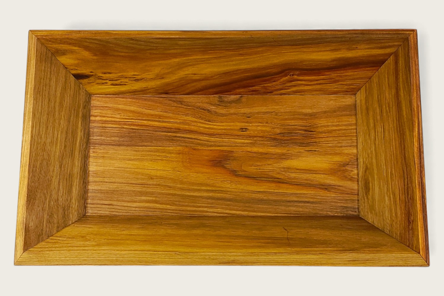Canarywood Catch-All Bowl (#340) with horizontal face grain, a rectangle shape, and a warm tung oil finish.